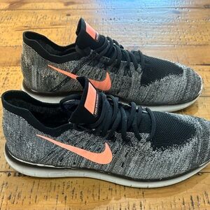 Nike Flyknit Black and Orange Running Shoes